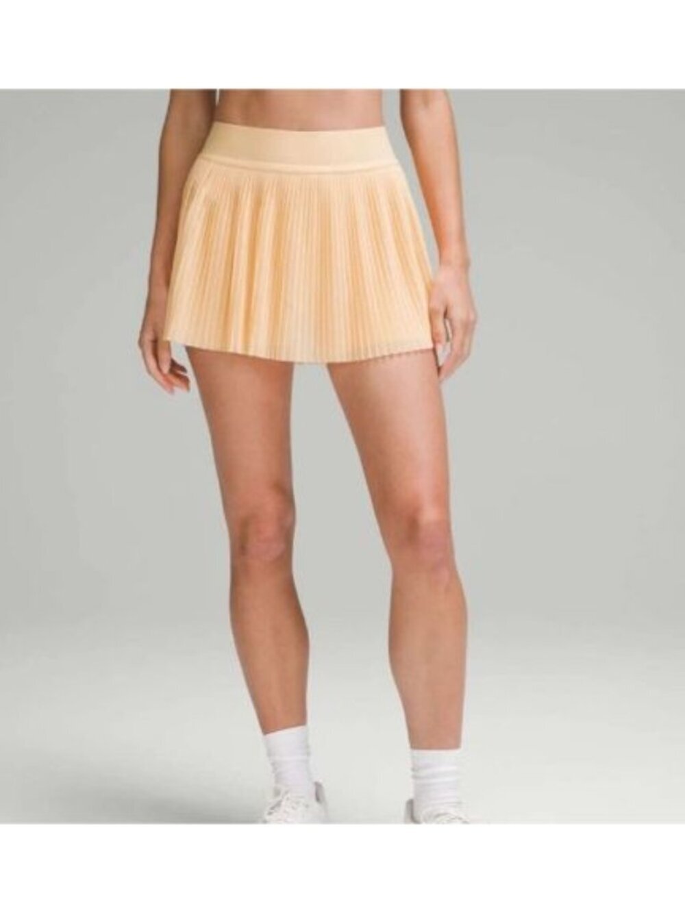 Lululemon Mesh Pleats Mid-Rise Mini Tennis Skirt in Summer Glow Orange
